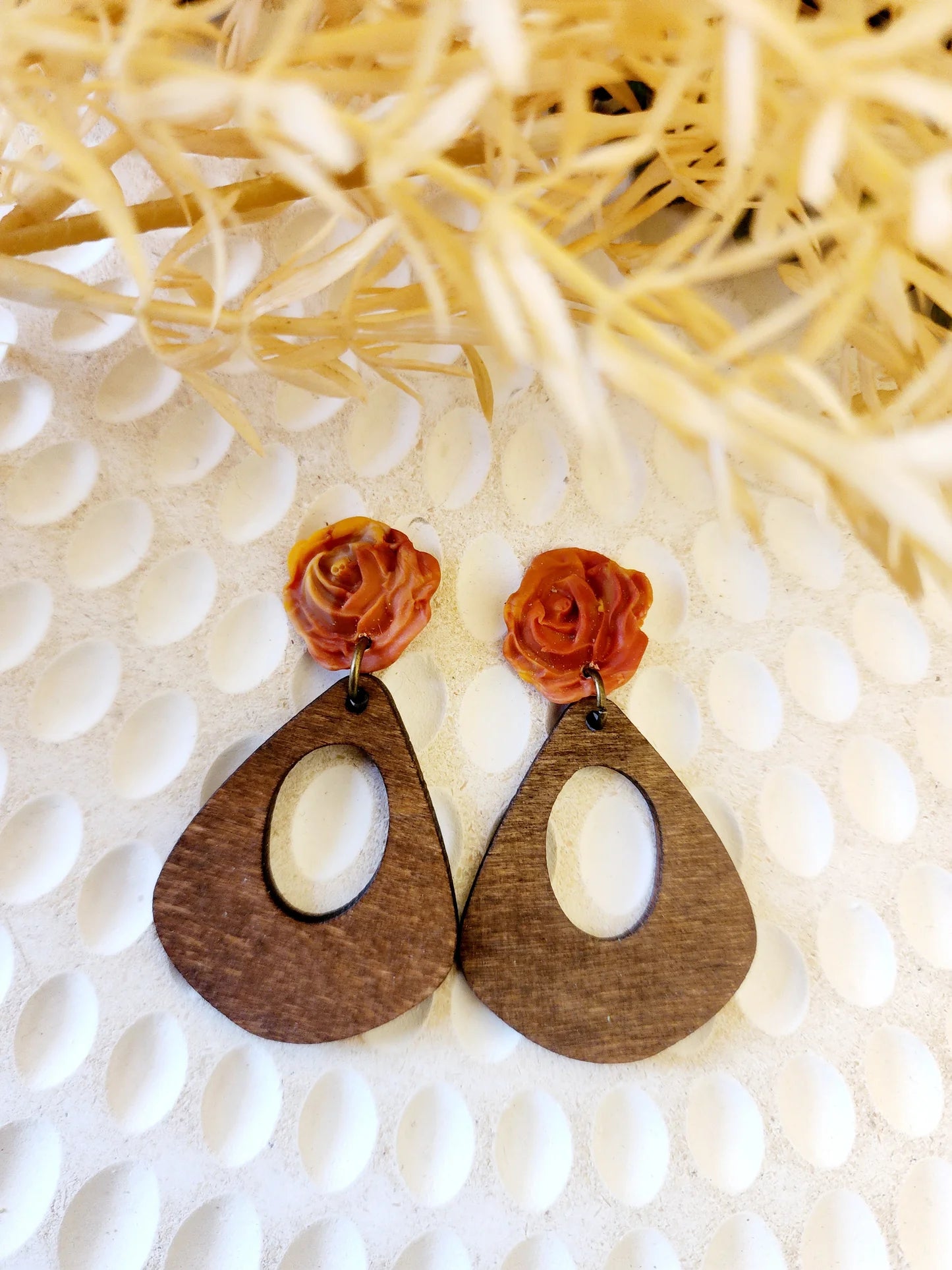 Dusty Orange handcrafted clay rose on a medium sized organic black Wooden pendant Australian Made Handmade