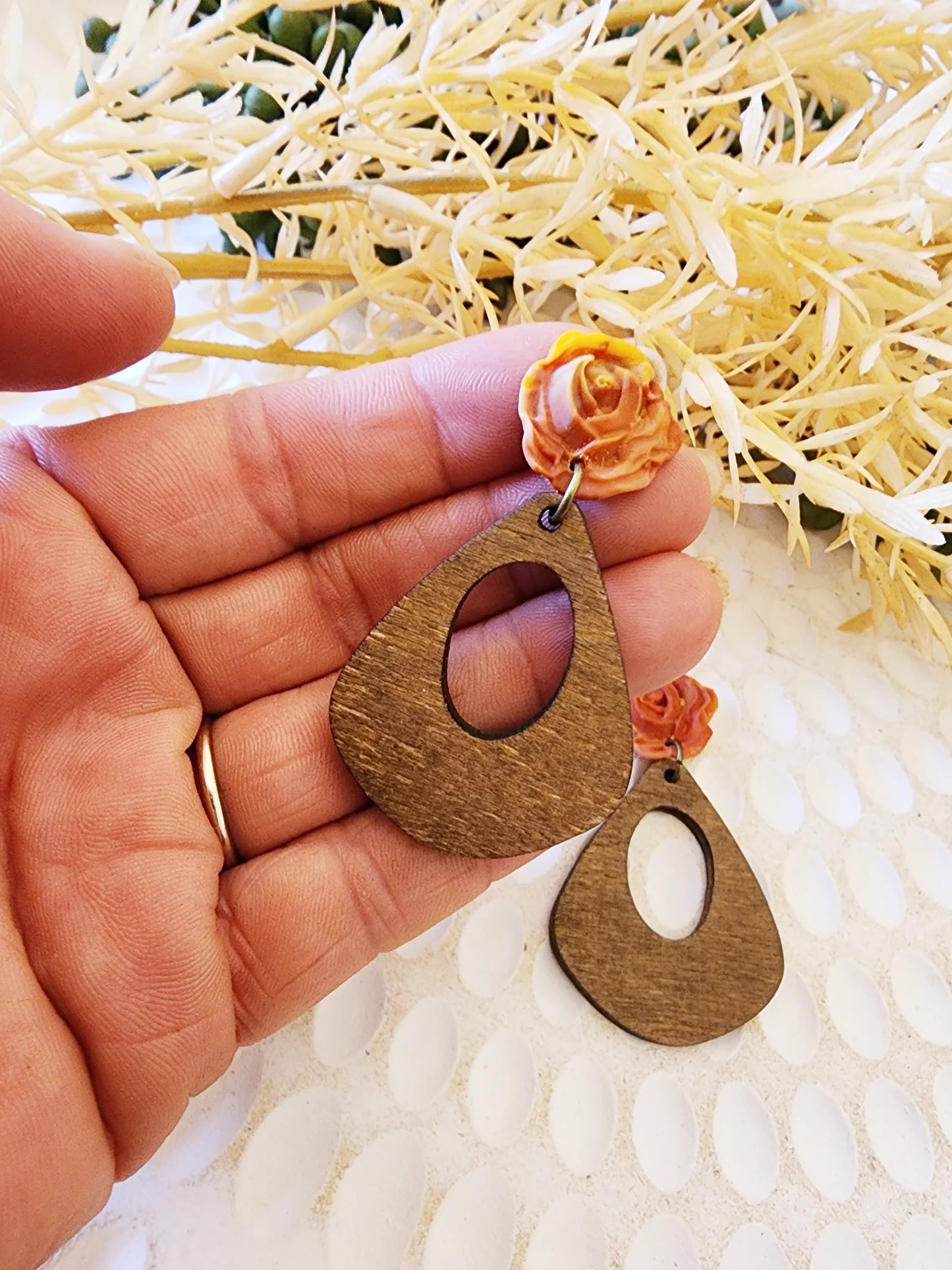 Dusty Orange handcrafted clay rose on a medium sized organic black Wooden pendant Australian Made Handmade