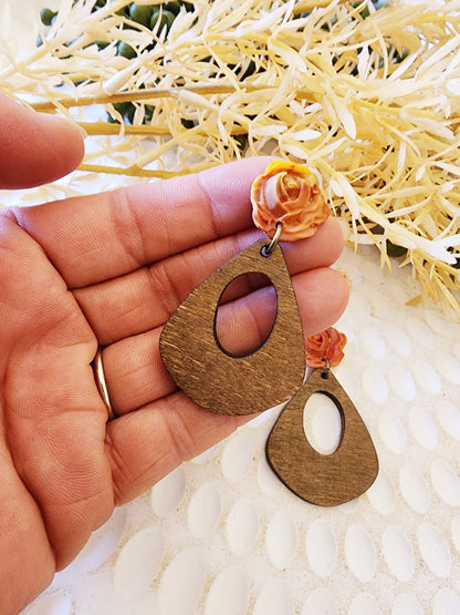 Dusty Orange handcrafted clay rose on a medium sized organic black Wooden pendant Australian Made Handmade
